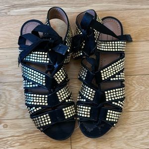 Alaia Studded Gladiator Sandals